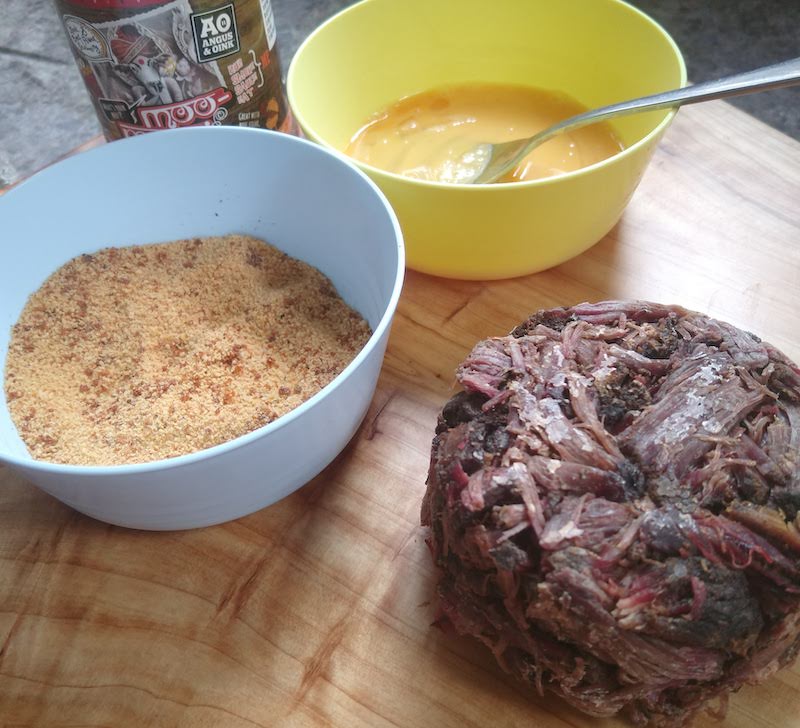 Beef rib patty ready to be coated